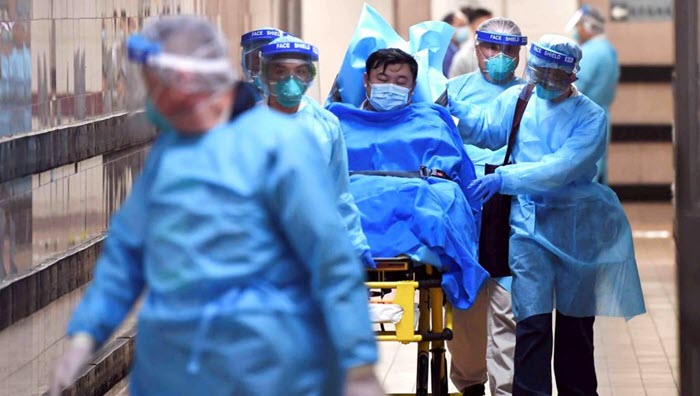  الفيروس يتفشى في الصين بوتيرة متسارعة (رويترز)